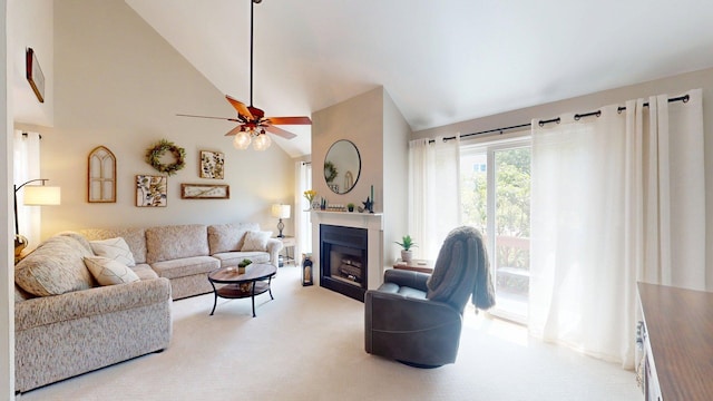 501 Bean Hill Rd Unit 32, Northfield, NH 03276 - living area featuring lofted ceiling, a fireplace, light carpet, and ceiling fan