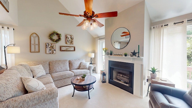 501 Bean Hill Rd Unit 32, Northfield, NH 03276 - carpeted living area with a fireplace, high vaulted ceiling, and ceiling fan