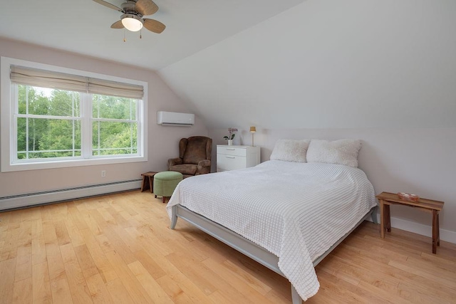 52 Jeffrey Dr, Sunapee, NH 03782 - bedroom featuring an AC wall unit, baseboard heating, light wood finished floors, lofted ceiling, and a ceiling fan