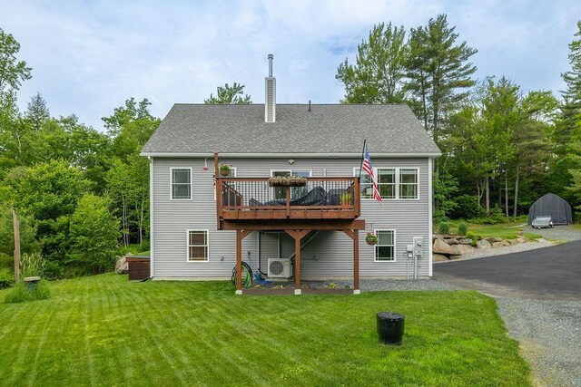 52 Jeffrey Dr, Sunapee, NH 03782 - rear view of house featuring a yard, a deck, and roof with shingles