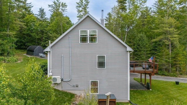 52 Jeffrey Dr, Sunapee, NH 03782 - view of property exterior featuring a deck, a lawn, and a chimney