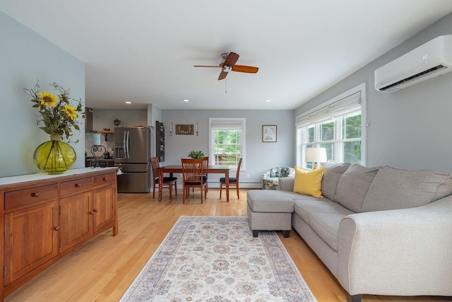 52 Jeffrey Dr, Sunapee, NH 03782 - living room featuring a wall mounted air conditioner, a ceiling fan, light wood-type flooring, recessed lighting, and a baseboard heating unit