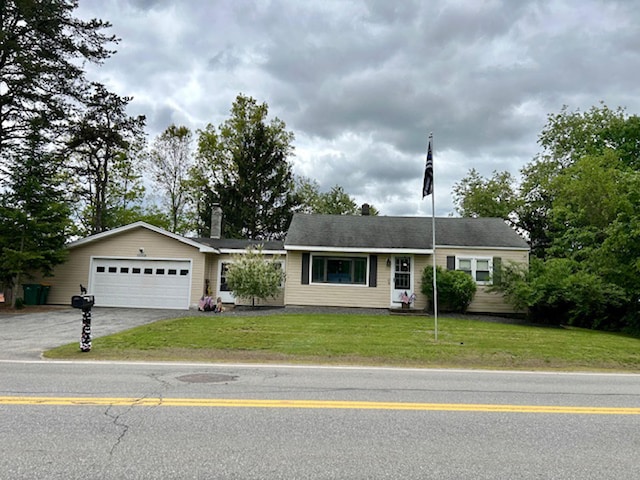 33 Salmon Falls Rd, Rochester, NH 03868 - ranch-style home with driveway, an attached garage, a front yard, and a chimney