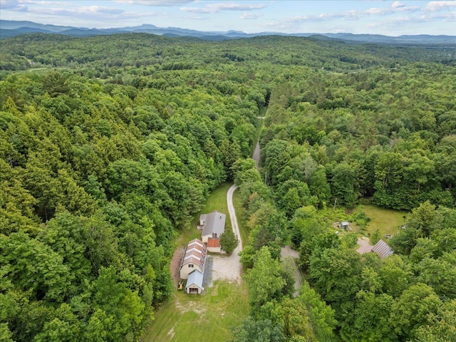 89 Catella Rd, Essex, VT 05452 - bird's eye view of a heavily wooded area and a mountain backdrop