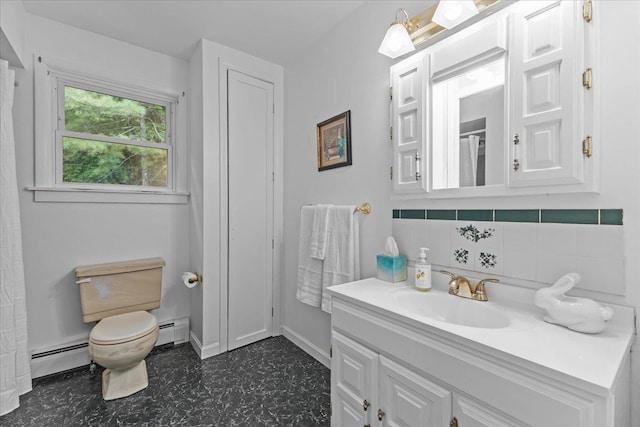 89 Catella Rd, Essex, VT 05452 - full bath featuring a baseboard radiator, tile patterned floors, vanity, and tasteful backsplash