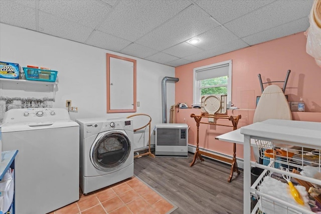 89 Catella Rd, Essex, VT 05452 - laundry room with separate washer and dryer, baseboard heating, and wood finished floors