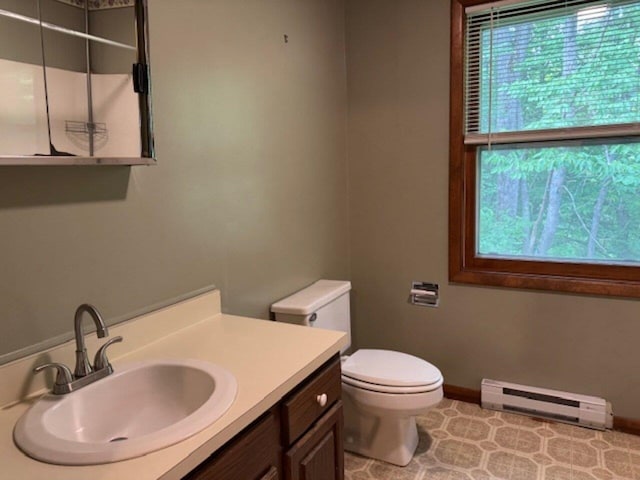 122 Batchelder St Unit A-8, Barre City, VT 05641 - bathroom featuring a baseboard heating unit and vanity