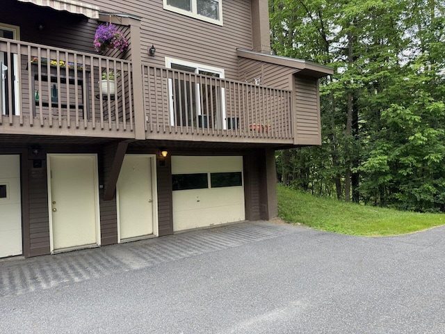 122 Batchelder St Unit A-8, Barre City, VT 05641 - view of home's exterior featuring driveway and a garage