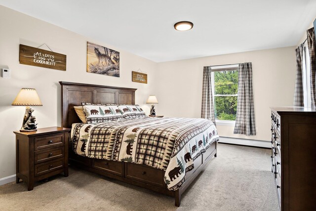 121 Deer Run Rd, Middleton, NH 03887 - bedroom with a baseboard radiator and light colored carpet