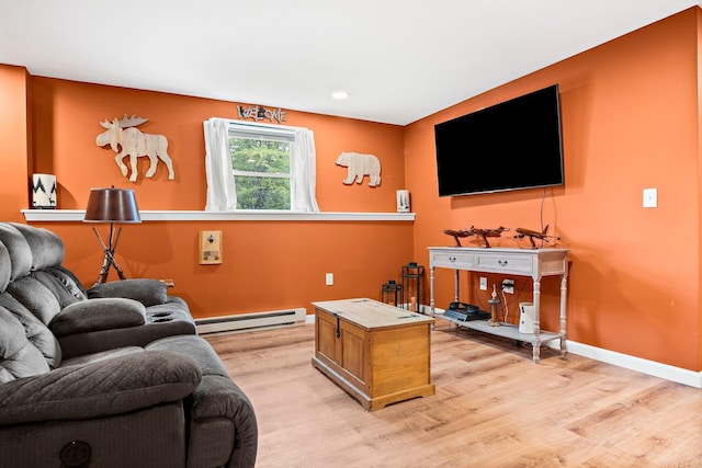 121 Deer Run Rd, Middleton, NH 03887 - living area with baseboard heating, light wood-type flooring, and recessed lighting