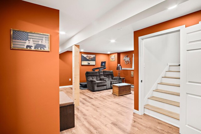 121 Deer Run Rd, Middleton, NH 03887 - living area featuring light wood-style floors, stairs, and recessed lighting