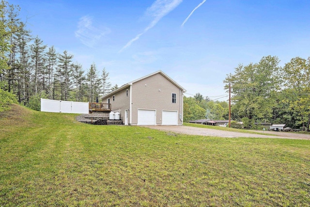 121 Deer Run Rd, Middleton, NH 03887 - view of side of property with driveway and an attached garage