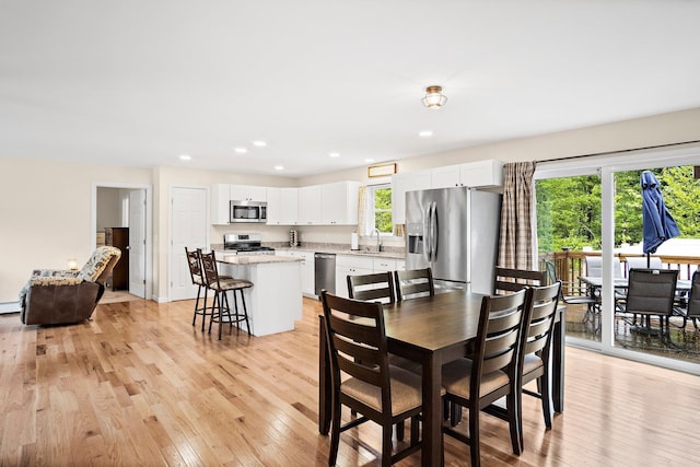 121 Deer Run Rd, Middleton, NH 03887 - dining space with light wood-style floors and recessed lighting
