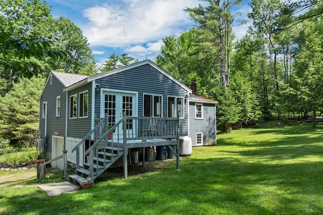 73 Tall Pine Rd, Farmington, NH 03835 - rear view of property with a chimney, roof with shingles, a lawn, and a deck