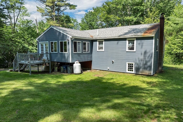 73 Tall Pine Rd, Farmington, NH 03835 - back of house with a deck, stairs, a lawn, and a shingled roof