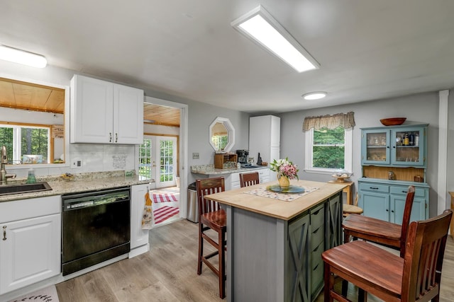 73 Tall Pine Rd, Farmington, NH 03835 - kitchen featuring dishwasher, wood counters, white cabinets, and plenty of natural light