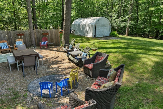 73 Tall Pine Rd, Farmington, NH 03835 - view of yard with a fire pit, a shed, and a patio