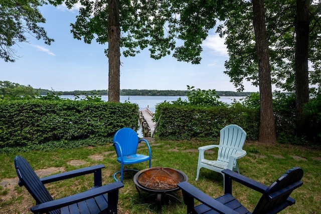 26 Colony Cove Rd, Durham, NH 03824 - view of grassy yard with an outdoor fire pit and a water view