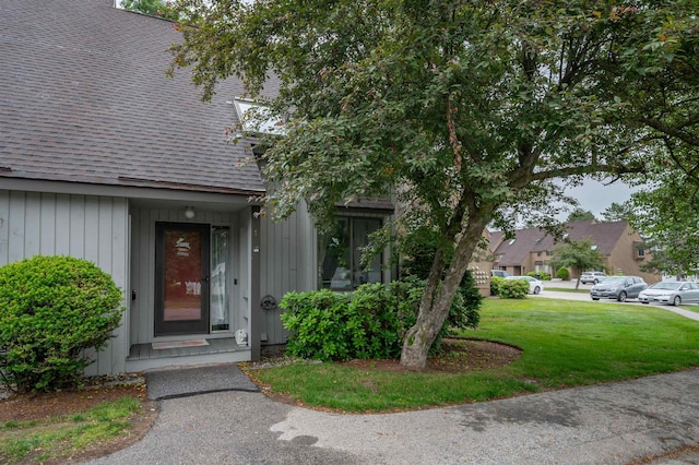 1 Harwich Ct, Merrimack, NH 03054 - entrance to property with a shingled roof and a lawn