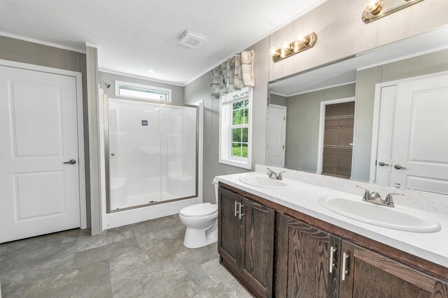 106 Stevens Rd Unit 1, Effingham, NH 03882 - full bathroom with a shower stall, double vanity, and a closet