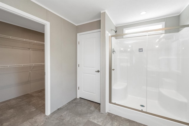 106 Stevens Rd Unit 1, Effingham, NH 03882 - full bath featuring a stall shower, crown molding, and a walk in closet
