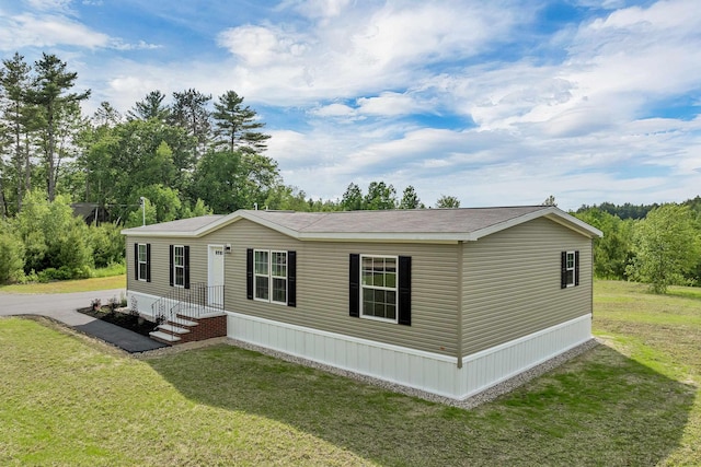 106 Stevens Rd Unit 1, Effingham, NH 03882 - view of front of home featuring a front lawn