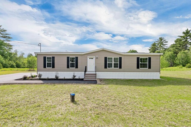 106 Stevens Rd Unit 1, Effingham, NH 03882 - manufactured / mobile home with a front yard and entry steps