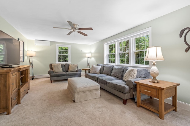 65 Forest St, Londonderry, NH 03053 - living room featuring ceiling fan, light colored carpet, and a wall unit AC