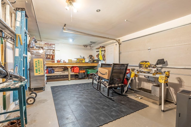 65 Forest St, Londonderry, NH 03053 - garage with a workshop area