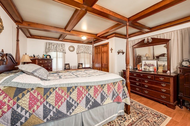 57 Rutland St, Dover, NH 03820 - bedroom featuring light wood finished floors, coffered ceiling, and beam ceiling