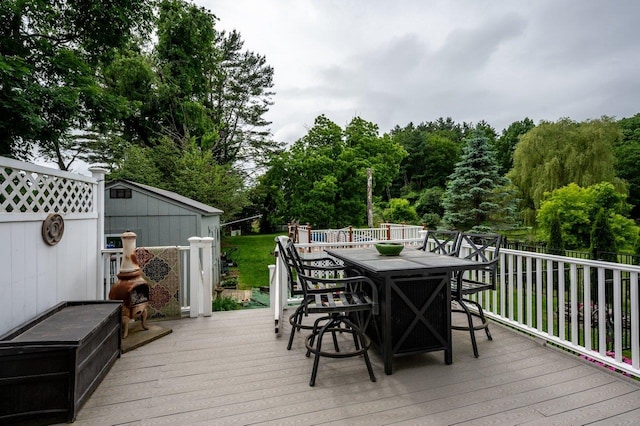 57 Rutland St, Dover, NH 03820 - wooden deck featuring outdoor dining space