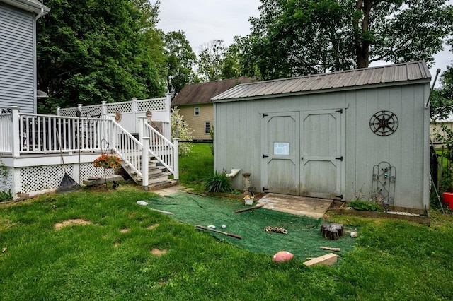 57 Rutland St, Dover, NH 03820 - view of grassy yard with a shed and a deck