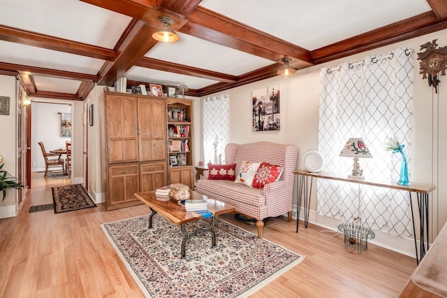 57 Rutland St, Dover, NH 03820 - living room with light wood-style flooring, coffered ceiling, beam ceiling, crown molding, and healthy amount of natural light