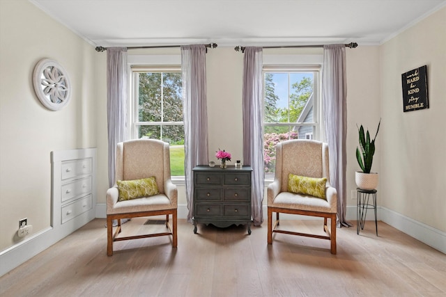261 Main Ave, South Hampton, NH 03827 - sitting room with plenty of natural light, wood finished floors, and ornamental molding