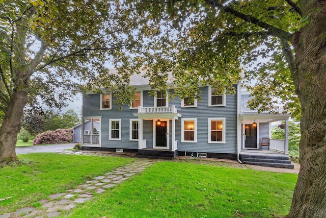 261 Main Ave, South Hampton, NH 03827 - view of front of house with a porch and a front yard