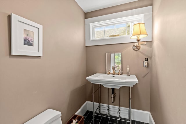261 Main Ave, South Hampton, NH 03827 - half bath featuring toilet and baseboards