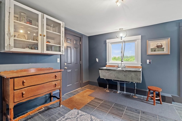 261 Main Ave, South Hampton, NH 03827 - interior space featuring glass insert cabinets and baseboards