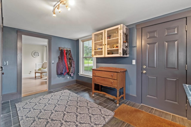 261 Main Ave, South Hampton, NH 03827 - foyer entrance with wood tiled floors and baseboards