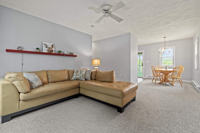 261 Main Ave, South Hampton, NH 03827 - carpeted living area with a chandelier and ceiling fan