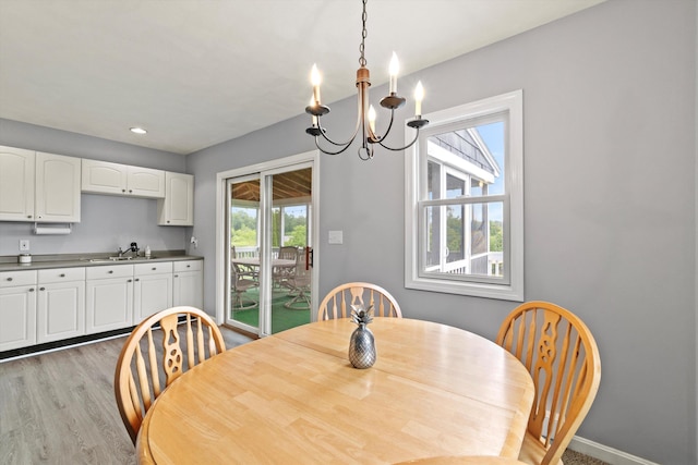 261 Main Ave, South Hampton, NH 03827 - dining space with a chandelier, light wood-type flooring, and recessed lighting