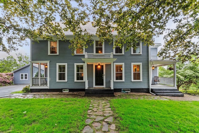 261 Main Ave, South Hampton, NH 03827 - view of front facade featuring a front yard and a porch