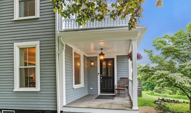 261 Main Ave, South Hampton, NH 03827 - doorway to property featuring a balcony and covered porch