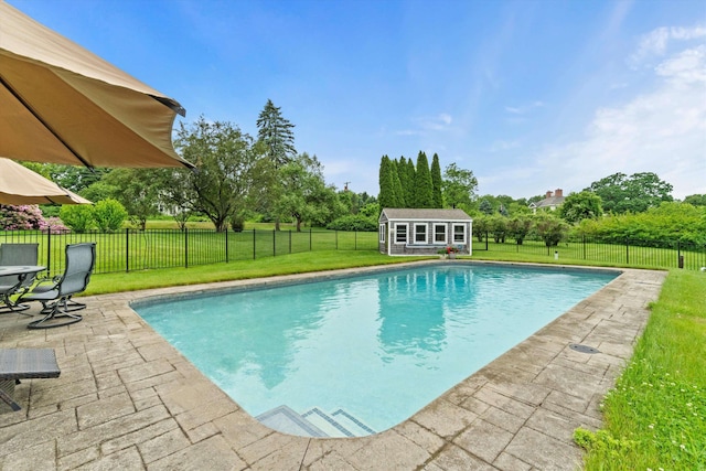 261 Main Ave, South Hampton, NH 03827 - view of pool with an outbuilding, a fenced backyard, and a patio area