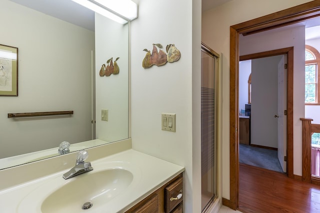 3440 Rte 44, West Windsor, VT 05037 - bathroom with vanity, wood finished floors, and a stall shower
