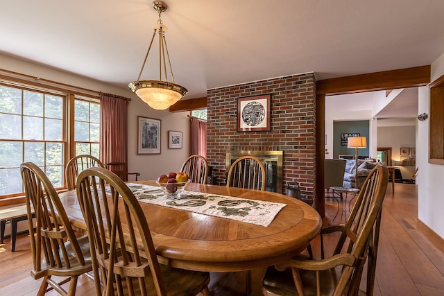 3440 Rte 44, West Windsor, VT 05037 - dining space featuring hardwood / wood-style flooring and a fireplace