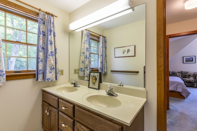 3440 Rte 44, West Windsor, VT 05037 - bathroom with double vanity, healthy amount of natural light, and ensuite bath