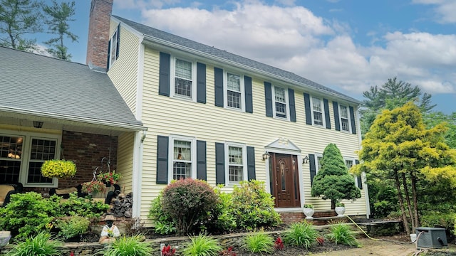 9 Oak Ridge Rd, Kensington, NH 03833 - colonial home featuring a chimney