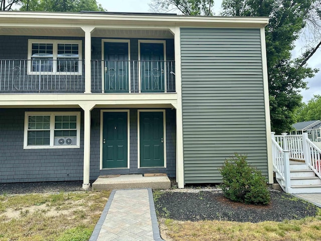 87 Cricketbrook Rd Unit 87, Dover, NH 03820 - view of front facade with a balcony and a porch