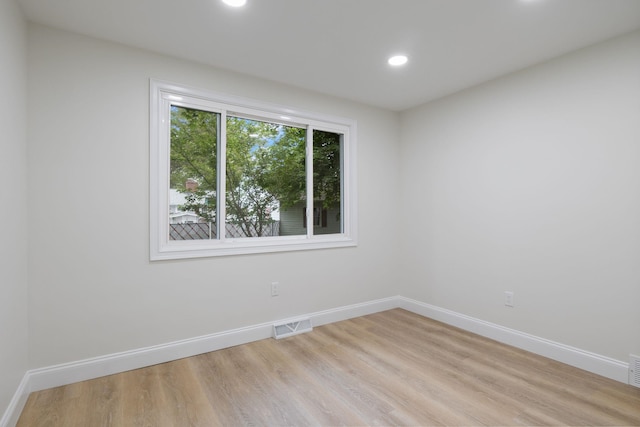 11 Bond St, Hudson, NH 03051 - unfurnished room with light wood-style flooring and recessed lighting