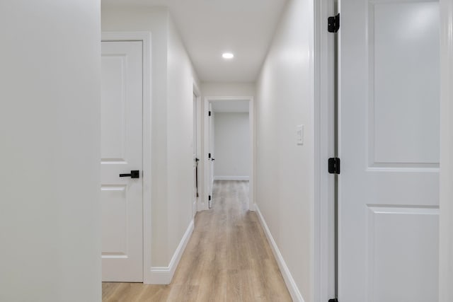 11 Bond St, Hudson, NH 03051 - corridor featuring light wood finished floors and recessed lighting